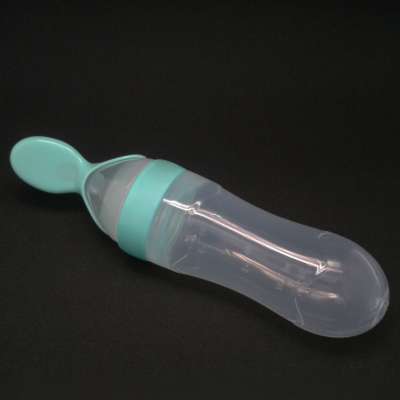 100%BPA free silicone squeezing feeder spoon baby silicone squeeze feeder